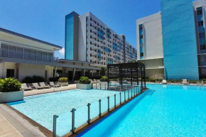 Oceanview apartment with pool, wifi & workspace